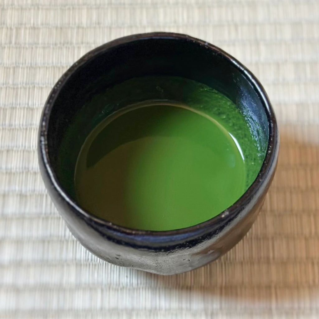 Hokoen Koun matcha tin with lid open showing green powder