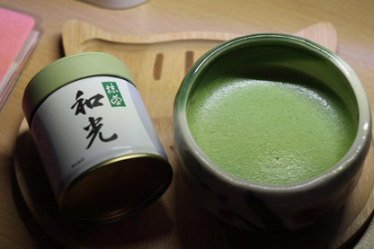 Marukyu Koyamaen Wako matcha being whisked in a ceramic bowl
